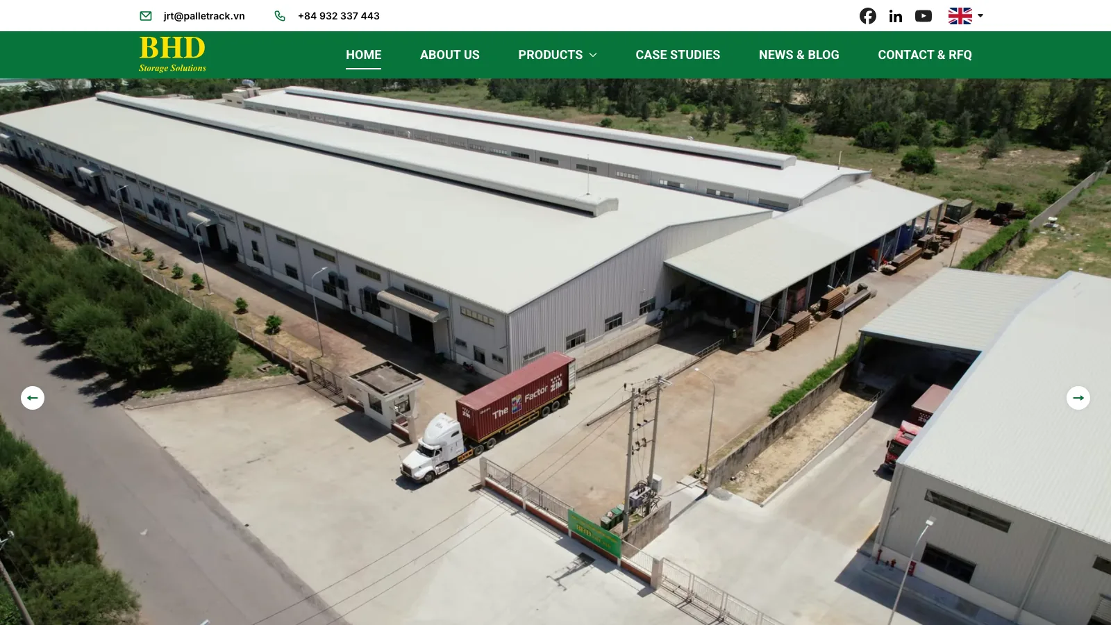 palletrack.vn home page over an aerial view of the BHD racking factory in Da Nang