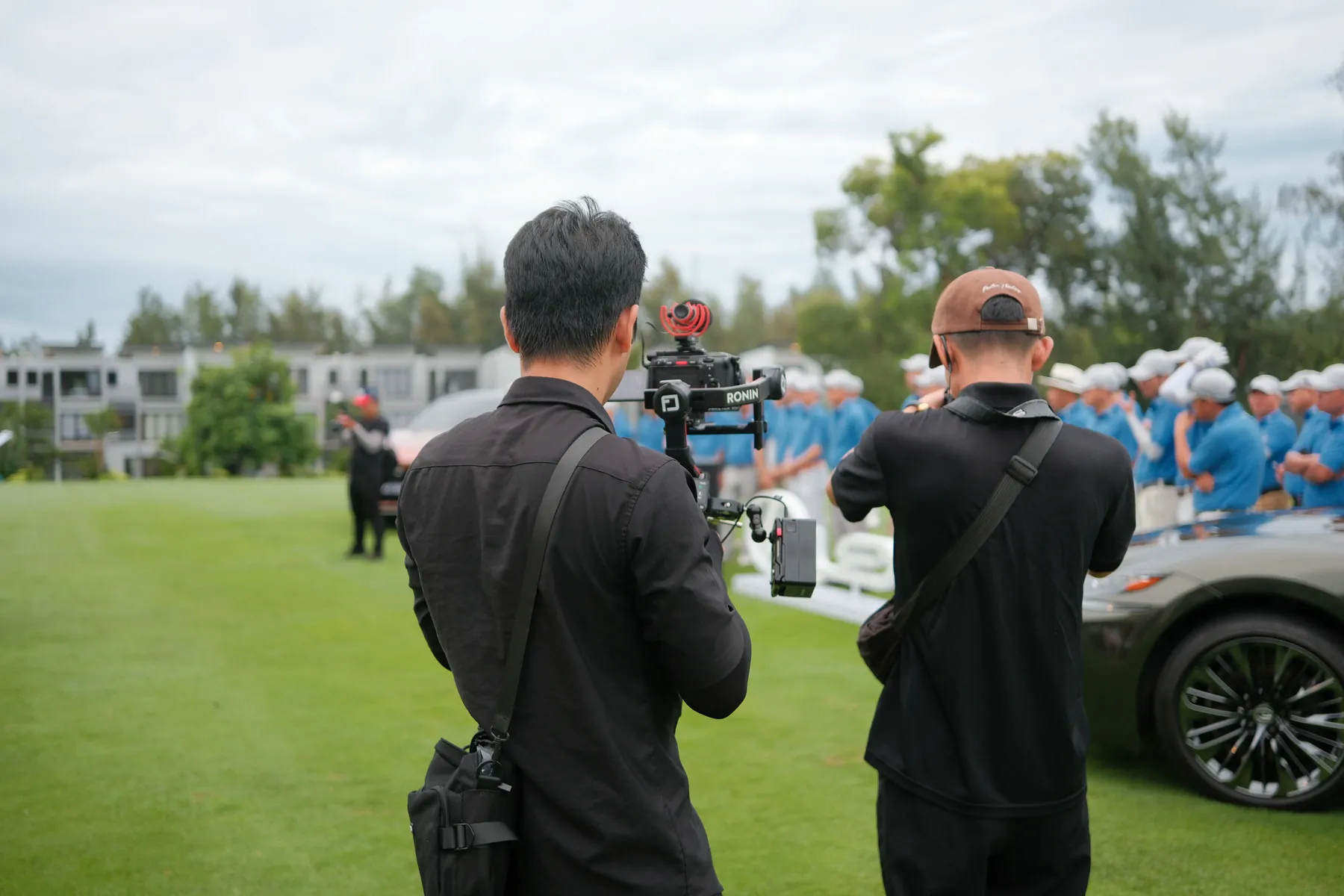 Two operators covering the trophy presentation