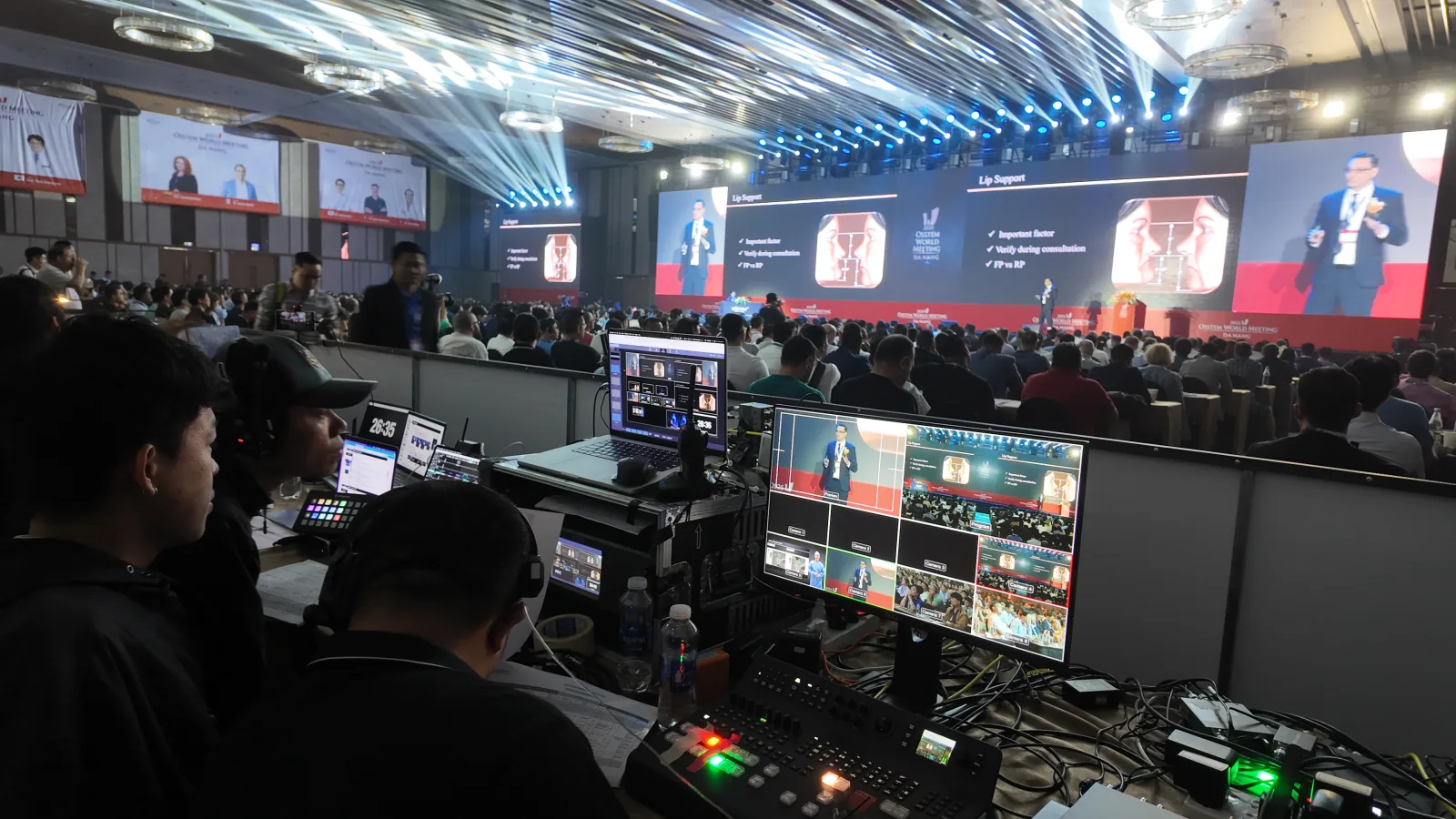 Live from the floor on day two, programme output carried on the hall walls