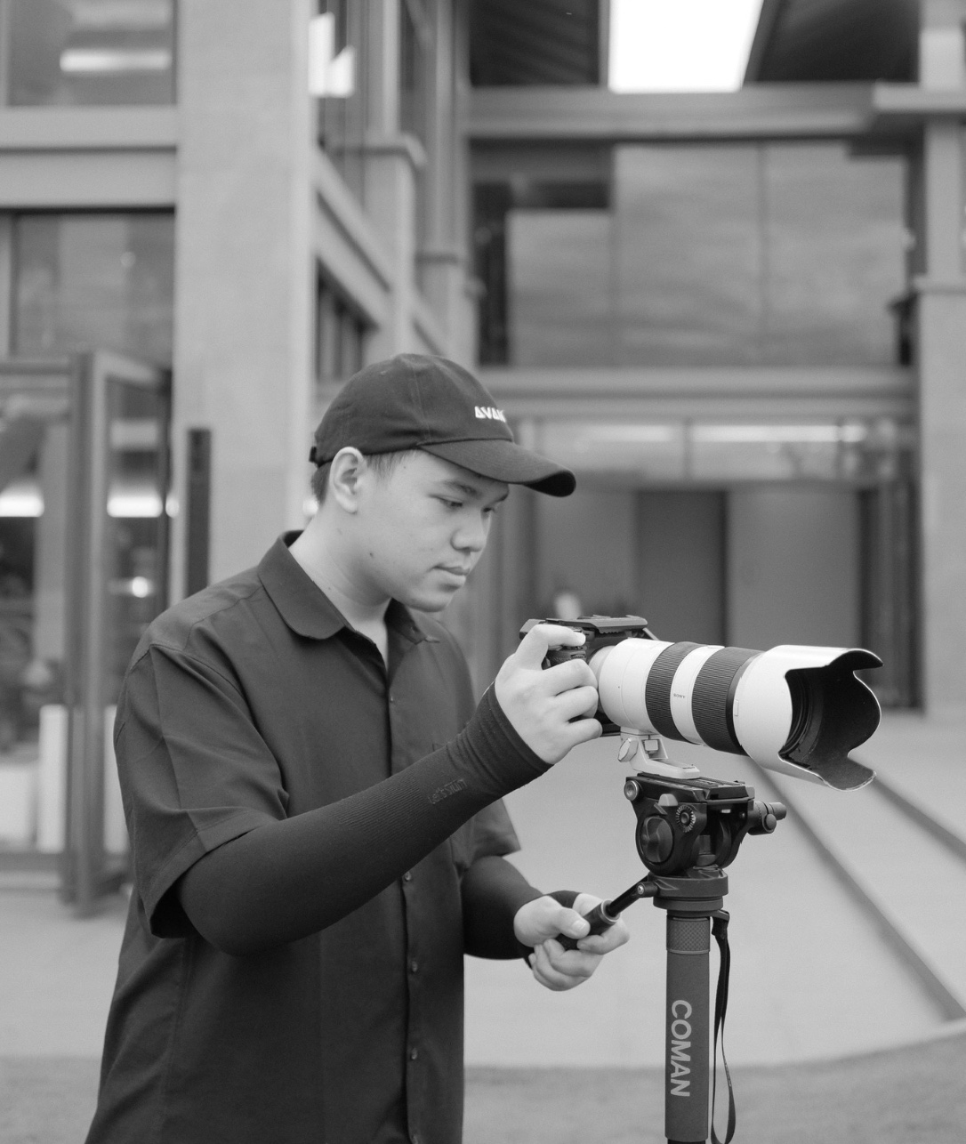 Duong Tran operating a Sony camera on a monopod during a DNX Agency shoot