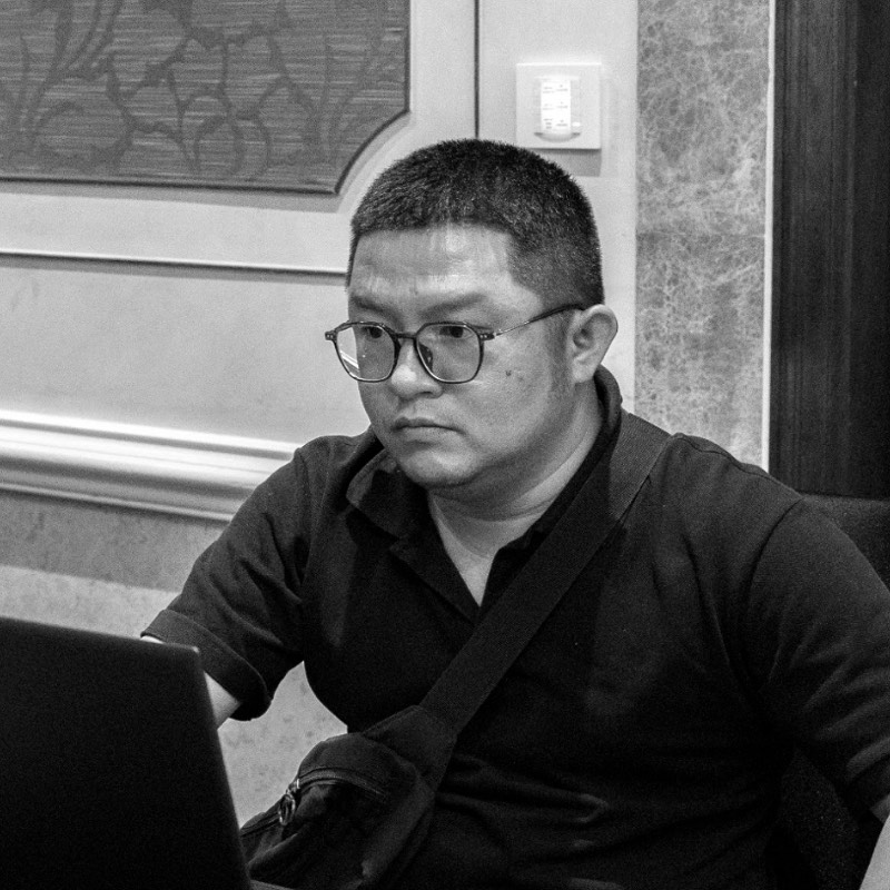 Khanh Le at the playback and livestream desk during a DNX Agency event