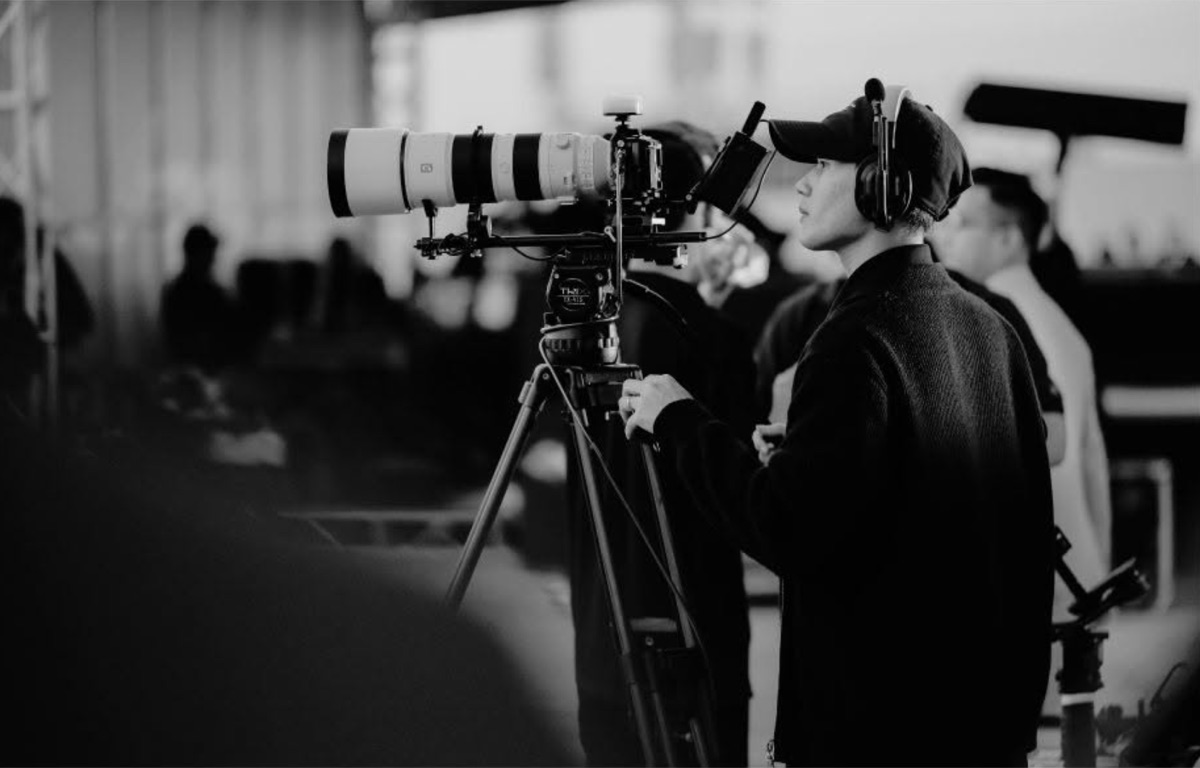 Nghia Ngo on camera during a DNX Agency shoot
